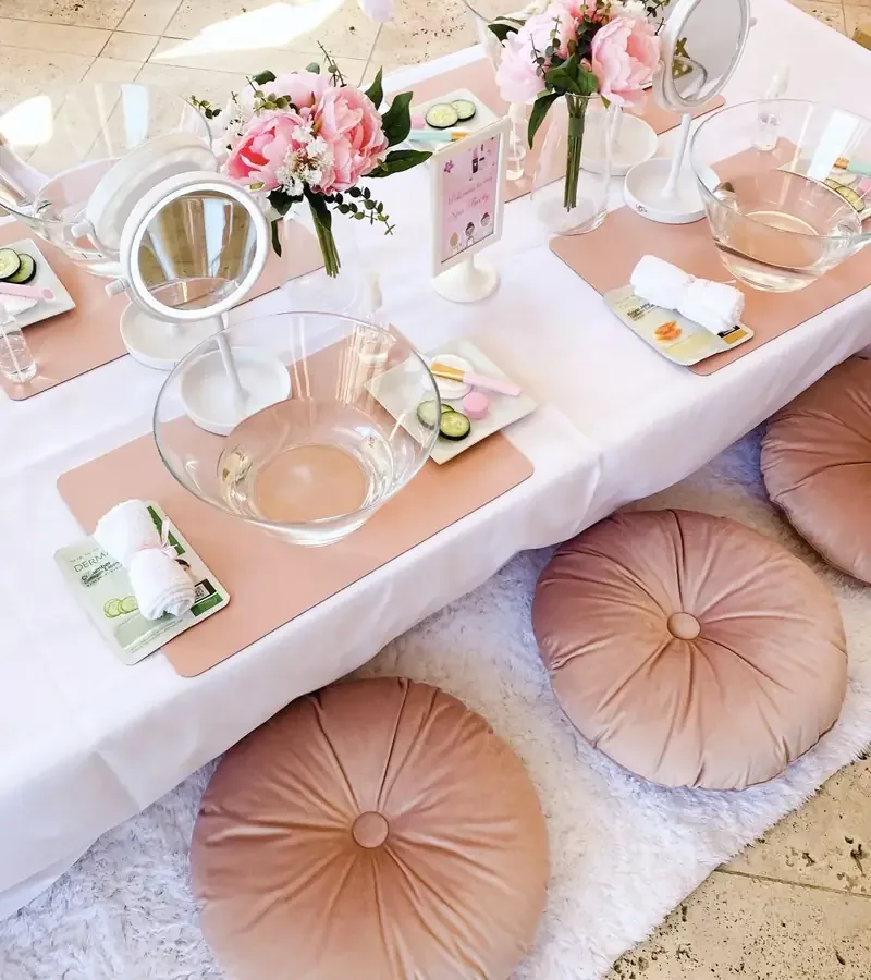 Spa table with mirrors, peonies and face masks