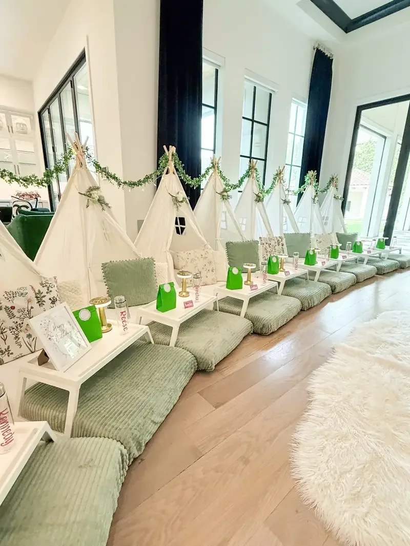 Teepees with personalised place cards and lanterns
