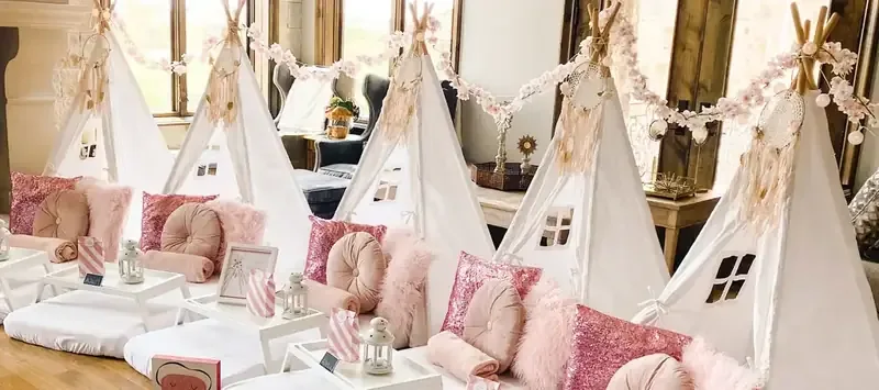Teepee sleepover styled in blush and gold for a Slumber Spa night